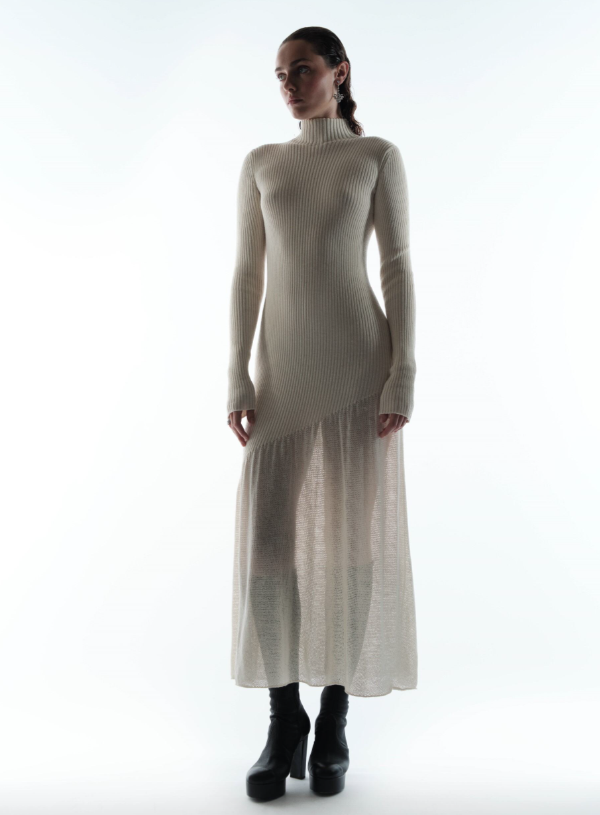 Earrings and ring _ Chaumet; Cream long-sleeve dress and black heeled boots _ Chanel