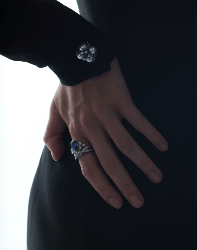 Ring _ Chaumet; Black dress _ Versace