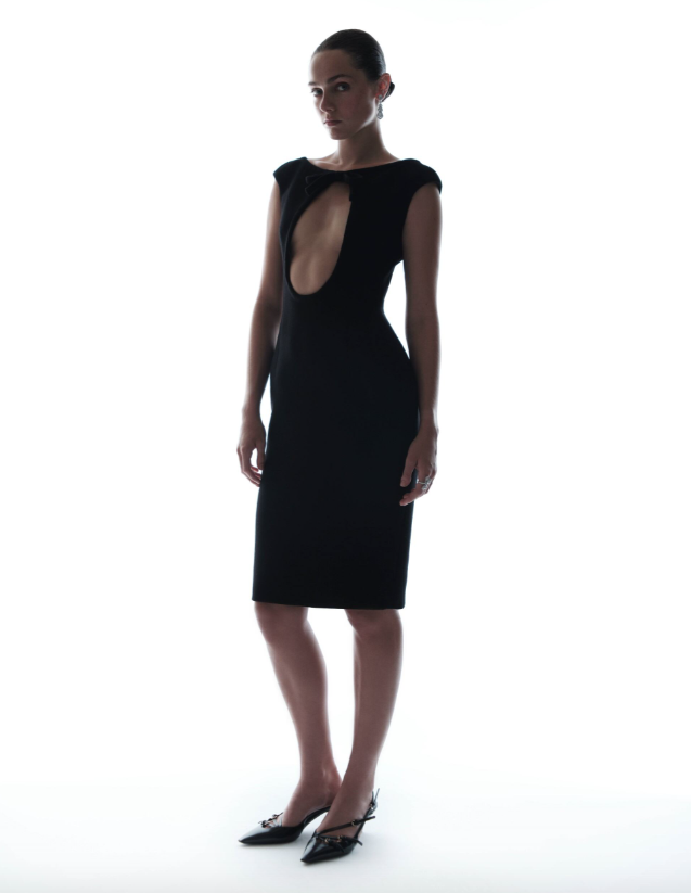 Earrings, necklace and ring _ De Beers; Black cutout dress and kitten heels _ Miu Miu