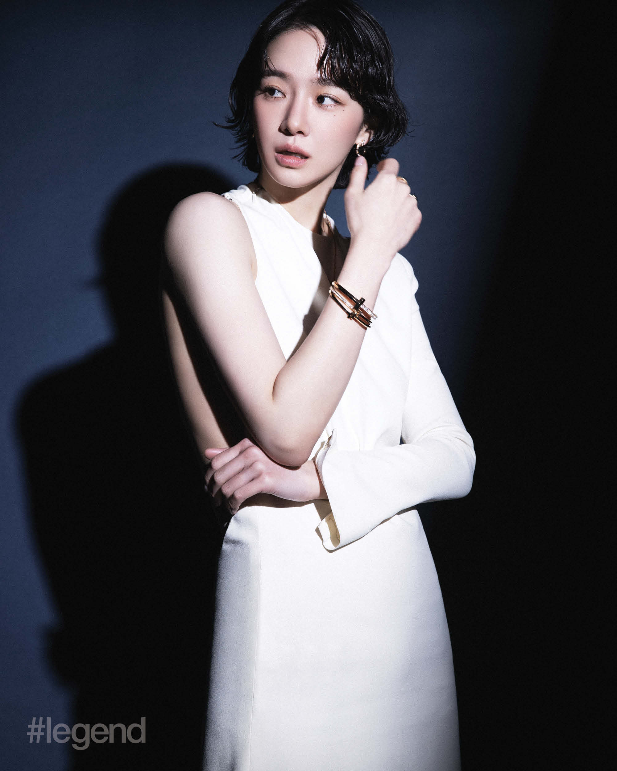 Tiffany T T1 earrings, pendant, bangles and ring in rose gold with diamonds, and bangle and ring in rose gold _ Tiffany & Co.; Ivory acetate viscose sable dress _ Gucci