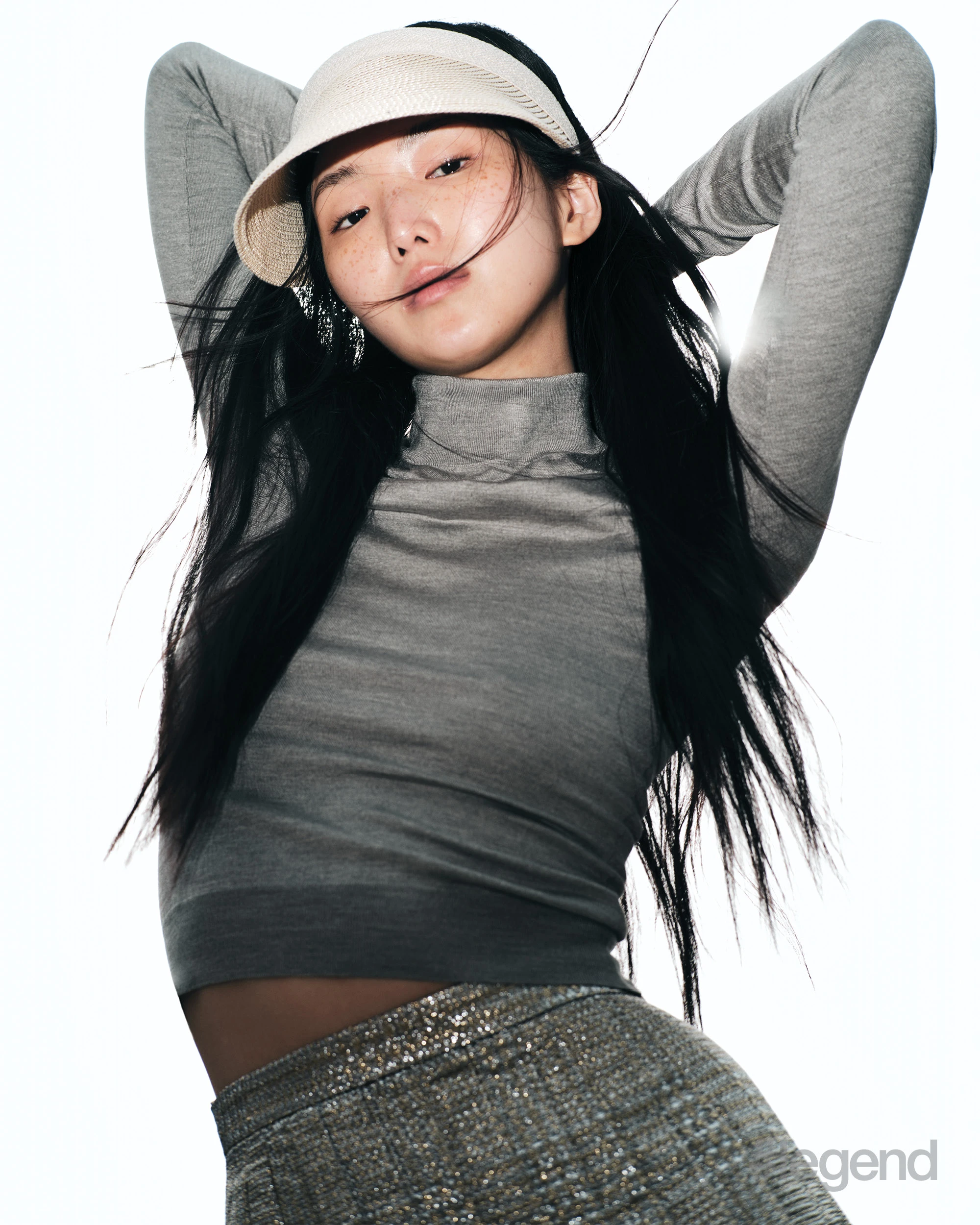 Grey turtleneck _ Ralph Lauren; Sequined skirt _ Celine (Stylist’s own cap)